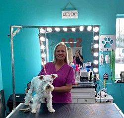 Leslie about to make this pooch pawtastic